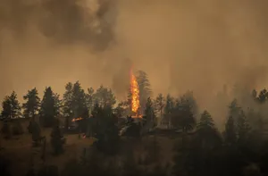 Raging wildfire forces 20,000 to flee in Canada