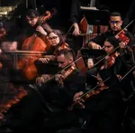 The Tehran Symphony Orchestra performed a concert titled &ldquo;From Beyond the Borders&rdquo; at Vahdat Hall on May 21, 2026. The performance was conducted by Omid Mehrabi.