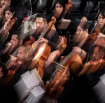 The Tehran Symphony Orchestra performed a concert titled &ldquo;From Beyond the Borders&rdquo; at Vahdat Hall on May 21, 2026. The performance was conducted by Omid Mehrabi.