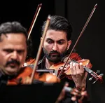 The Tehran Symphony Orchestra performed a concert titled &ldquo;From Beyond the Borders&rdquo; at Vahdat Hall on May 21, 2026. The performance was conducted by Omid Mehrabi.