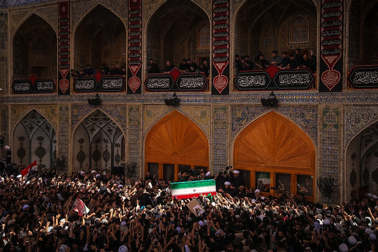 In the loving embrace of Imam Hussein: Martyr Khamenei