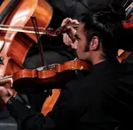 The Tehran Symphony Orchestra performed a concert titled &ldquo;From Beyond the Borders&rdquo; at Vahdat Hall on May 21, 2026. The performance was conducted by Omid Mehrabi.